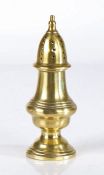 A George III brass sugar castor, circa 1800 Of typical baluster silver-form, the pierced screw-top
