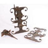 Parts from mid-18th century iron and steel spit-jacks, English To include a decorative scroll