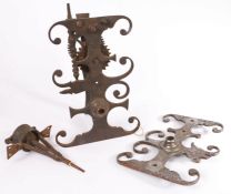 Parts from mid-18th century iron and steel spit-jacks, English To include a decorative scroll