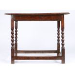 A Charles II elm and oak centre table, circa 1680 The well-figured elm top formed principally from