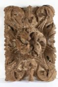 A large 15th/16th century oak ceiling boss, Of rectangular form, designed with a large swirling