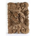 A large 15th/16th century oak ceiling boss, Of rectangular form, designed with a large swirling