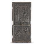 A 17th century cast iron fireback, dated 1663 Designed with Christ crucified next to the Brazen