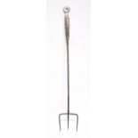 A George III steel toasting fork, circa 1780-1800 Wiith three staggered tines, their joint with
