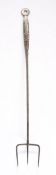 A George III steel toasting fork, circa 1780-1800 Wiith three staggered tines, their joint with