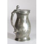 A pewter OEWS half-pint ball-and-bar baluster measure, English, circa 1700 The flat lid with two