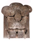 A large 17th century engraved steel lock, German With back and front plates, the latter foliate