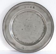 A Queen Anne pewter multi-reeded plate, Southern England, circa 1710 Hallmarks to front rim and