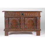 A good Elizabeth I oak and inlaid coffer, circa 1570 The boarded lid with reeded and ovolo-moulded