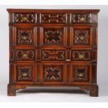 A striking and good Charles II walnut, fruitwood and inlaid chest of drawers, circa 1680 Of four