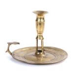 A George III brass ejector chamberstick, circa 1780 Having a vase-shaped socket with flared rim
