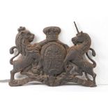 A 19th century cast iron British Royal Coat of Arms With typical lion and unicorn supporters, height