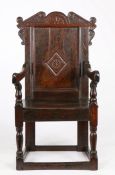 A Charles II oak panel-back open armchair, owner-initialled, Yorkshire/Derbyshire, circa 1670 The