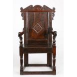 A Charles II oak panel-back open armchair, owner-initialled, Yorkshire/Derbyshire, circa 1670 The