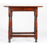 A particularly small George I fruitwood and pine centre table, circa 1720 With square-edged