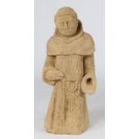 A stone carved figure of a monk, in the 15th century manner, possibly English Standing, with