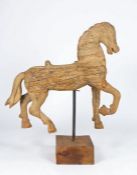 An interesting early 19th century pine model of a horse Probably from a carousel, with one foreleg