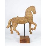 An interesting early 19th century pine model of a horse Probably from a carousel, with one foreleg