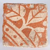 A late 15th century floor tile, Bristol, circa 1480 With a stiff leaf design in white, 12cm square