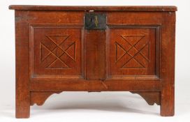 A small Elizabeth I oak and inlaid coffer, circa 1570 Having a triple-panelled lid, the front of two