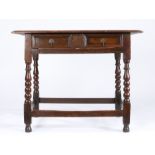 A Charles II oak side table, circa 1680 Having a triple-boarded and ovolo-moulded top, and a