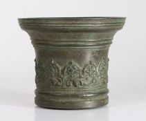 An interesting 17th century bronze mortar, Italian Cast with a foliate-filled arcade, diameter 13.