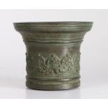 An interesting 17th century bronze mortar, Italian Cast with a foliate-filled arcade, diameter 13.