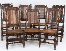A harlequin set of seven late 17th century walnut and cane side chairs, English, circa 1685