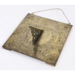 An engraved brass sundial, English, dated 1716 With ornate pierced gnomon, the near-square backplate
