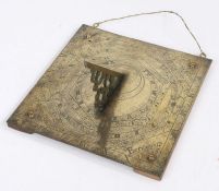 An engraved brass sundial, English, dated 1716 With ornate pierced gnomon, the near-square backplate