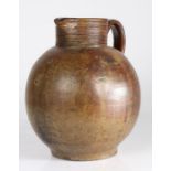 A large 17th century stoneware 'Bell-Ringers' jug, English Of ovoid form, with tall ribbed collar,