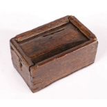 A small 17th century oak box, English, circa 1700 Of simple boarded construction, with sliding