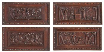 Four late 16th century oak carved panels, Flemish, circa 1580 One designed with ‘The Sacrifice of