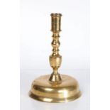 A late 17th century bronze-alloy dome-base socket candlestick, Spanish, circa 1690 The cylindrical