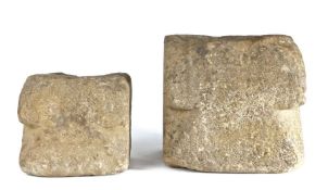Two graduated stone mortars, 17th century or possibly earlier, English, Each with rounded rim and