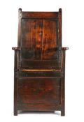 An early 18th century oak and fruitwood box-seat armchair, English/Welsh, circa 1700-30 With plain