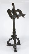 A 16th/17th century carved oak standing lecturn, Surmounted by a 16th century eagle, fully feather-