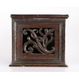 A rare mid-17th century oak table-top food safe, English, circa 1640-80 Of boarded construction,