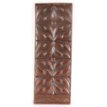 A mid-17th century yew panel, French, circa 1640 Carved with a repeating quatrefoil design of paired