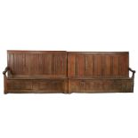 An impressively long early 17th century oak, chestnut and beech box-seated settle, Spanish In two-