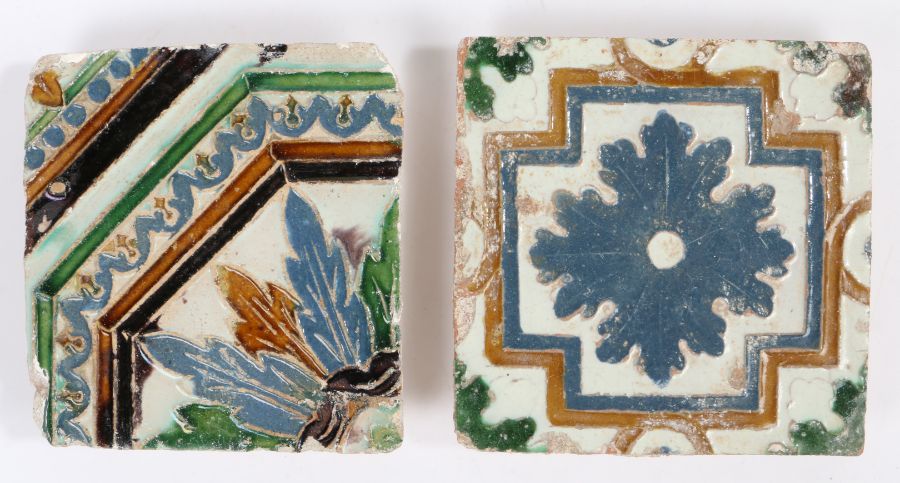 Two late 15th - early 16th century tiles, Spanish, circa 1500 Cuenca technique, one designed with