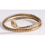 A gold snake arm bangle, the flexible coiled bracelet is formed of concentric scale like steel