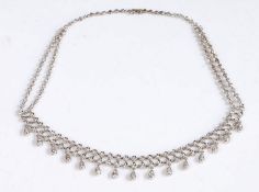 18 carat white gold and diamond fringe necklace, formed of two graduated strands of millegrain set