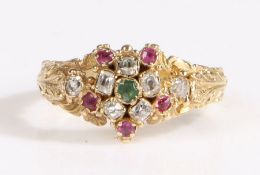 Emerald, diamond and ruby Giardinetto ring, having an emerald and diamond flowerhead surrounded by