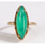 A 9 carat gold and jade ring, the head set with a thin elliptical jade stone, ring size L weight 3.2