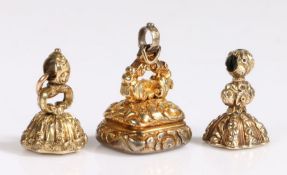 A set of three antique fob seals, comprised of one larger fob and two further smaller fobs. Each fob