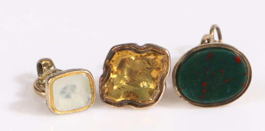 Three 19th Century yellow metal fob seals, one set with bloodstone, citrine and a clear stone - Image 2 of 2