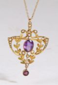 9 carat amethyst and pearl pendant and brooch of fine foliate design, the central oval cut
