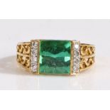 A 18 carat gold pirineu tourmaline and diamond ring, the head set with antique cushion cut pirineu