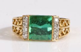 A 18 carat gold pirineu tourmaline and diamond ring, the head set with antique cushion cut pirineu